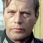 Imagen de Helmuth Schneider con uniforme militar, en su papel dentro de La Brigada de los Condenados (1969)