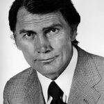 Retrato en blanco y negro de Jack Palance, actor estadounidense que interpretó al reverendo Josiah Galt en The Desperados (1969), rodada en parte en Villamanta.