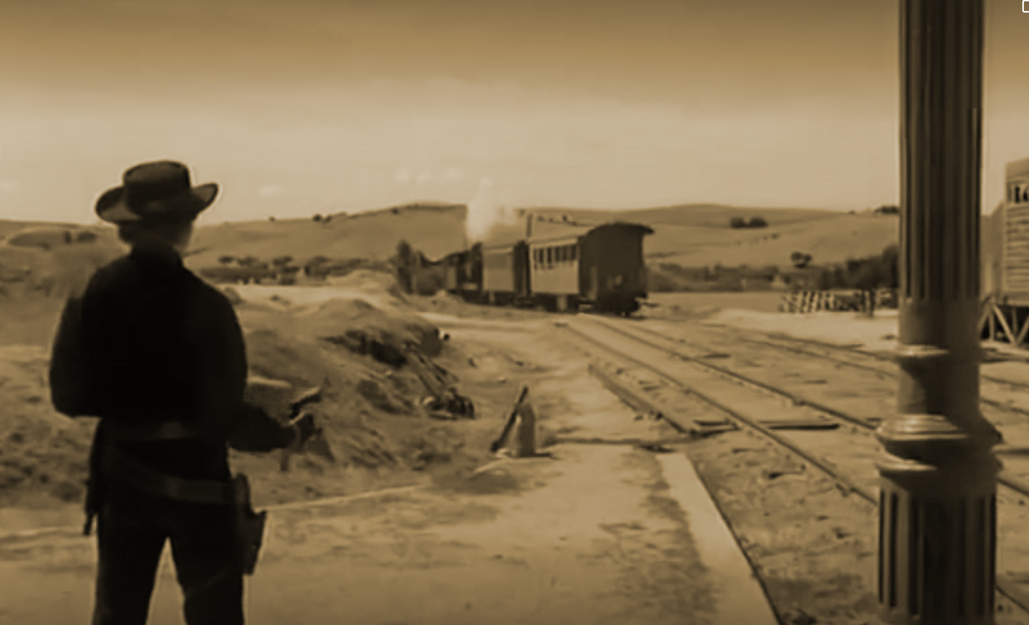 Silueta de un pistolero en la estación de tren de Villamanta mientras un tren se aleja en la película Manos Torpes (1970).
